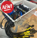 Gray plastic enclosure of kulp k16 pro showing circuit board with black connectors and coiled blue yellow cables