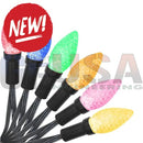 Colorful led christmas light bulbs with black bases and textured glass in green blue orange pink and yellow from mattos designs