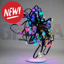 A vibrant tangled cluster of multicolored evo+ pixels 12v led pixels with translucent bulbs and black cords
