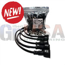 Black ignition coil wires with numbered injection molded connectors and a bag of matching black spark plug boots for easy pigtail management