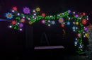 A 2 foot vine leaf run floral archway with vibrant red green blue purple and yellow led lights by gilbert engineering usa for xlights models