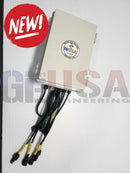 Beige plastic outdoor fiber optic junction box with black cables and yellow labels for quin-led-dig-quad controller