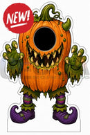 Orange pumpkin-shaped monster photo op prop with green claws purple boots and black hole mouth for interactive photo fun