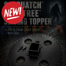 Black metal sliding topper with circular base and central mounting bracket for sasquatch mega tree lighting system
