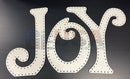White joy letter cutout with decorative perforated edges laser cut by gilbert engineering usa for mini lights decor