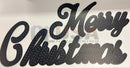 Black metallic merry christmas sign with perforated cursive design measures approximately inches tall and wide