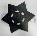 Black star shaped metal plate with six hex cutouts matte finish laser cut by gilbert engineering usa flake d 12-25