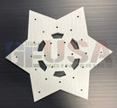 White star-shaped metal plate with hexagonal cut-out patterns and holes laser cut by gilbert engineering usa flake d 12-25