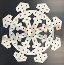 White wooden laser cut snowflake ornament with intricate patterns and holes from gilbert engineering usa for mini lights