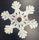White impression flake laser cut metal craft piece with perforated details and central hole by gilbert engineering usa