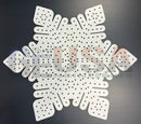 White snowflake-shaped laser cut placemat with perforated pattern by gilbert engineering usa products flake o