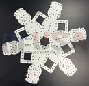 White snowflake-shaped frosty flake pegboard with holes and geometric cutouts by gilbert engineering usa