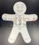 White gingerbread boy metal template with black dots for embroidery laser cut by gilbert engineering usa