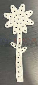 White plastic flower-shaped pegboard with perforated petals and stem from gilbert engineering products daisy flower usa
