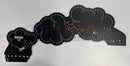 Black metal puzzle board with left facing train smoke clouds cutouts and silver stitching details for wiring diagram use