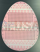 Pink impression easter eggs pegboard with white geometric patterns and evenly spaced holes, perfect for decoration