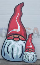 Red and white painted wooden christmas gnome cutouts with black outlines from impression christmas gnome by gilbert engineering usa