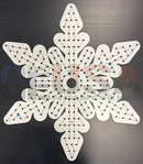 White snowflake-shaped pegboard with black pattern and labeled points from impression flake i by gilbert engineering usa