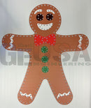 Impression gingerbread boy laser cut decorative panel by gilbert engineering usa features brown gingerbread with white icing and red bow tie