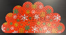 Red scalloped pegboard with festive white green and gold snowflakes pattern for impression peacock arch by gilbert engineering usa