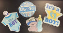 Blue and white baby boy yard art featuring it is a boy theme with cartoon onesie teddy bear bottle and footprint by gilbert engineering usa