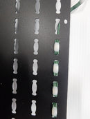 Green and white beaded bracelet with woven cord design featuring matrix 4x8 mesh by gilbert engineering usa laser cut