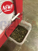 A clear plastic container filled with gold magnetic pixel mounts hanging from a red wooden structure in magmount 10 pack
