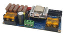 Blue quinled-dig-quad diy circuit board with brown relays yellow capacitors and white microcontroller for dynamic holiday lights