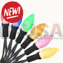 A set of colorful translucent 12v replica c7 pixels double data pixastring bulbs by mattos designs with speckled finishes