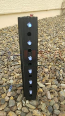 Black rectangular led light fixture from gilbert engineering usa with vertical blue lights for peace family stakes